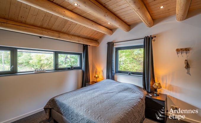 Spacious chalet for 8 people in Trois-Ponts with indoor-outdoor pool, sauna and private terrace by the water