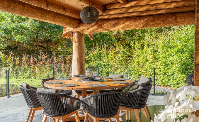 Spacious chalet for 8 people in Trois-Ponts with indoor-outdoor pool, sauna and private terrace by the water