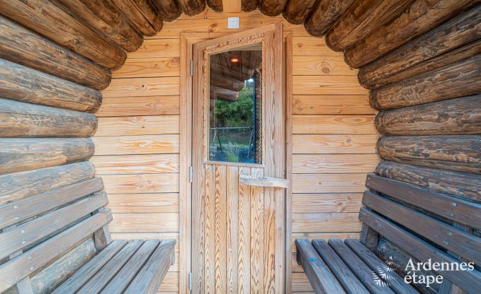 Spacious chalet for 8 people in Trois-Ponts with indoor-outdoor pool, sauna and private terrace by the water