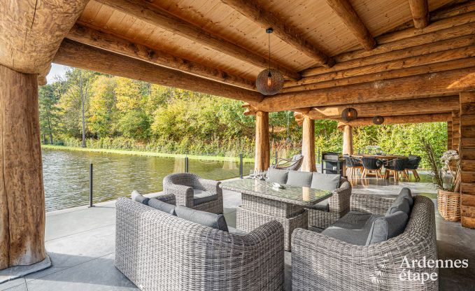 Spacious chalet for 8 people in Trois-Ponts with indoor-outdoor pool, sauna and private terrace by the water